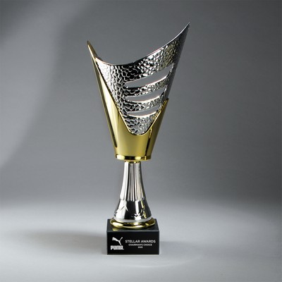 Large Gold/Silver Plastic Cup on Marble